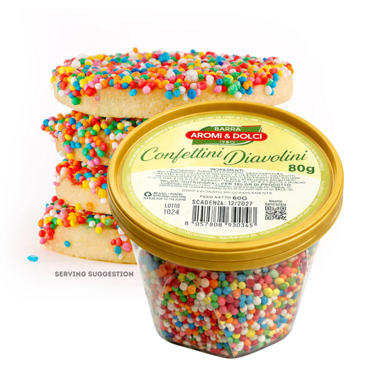 Jar of colorful sprinkles with cookies on a white background